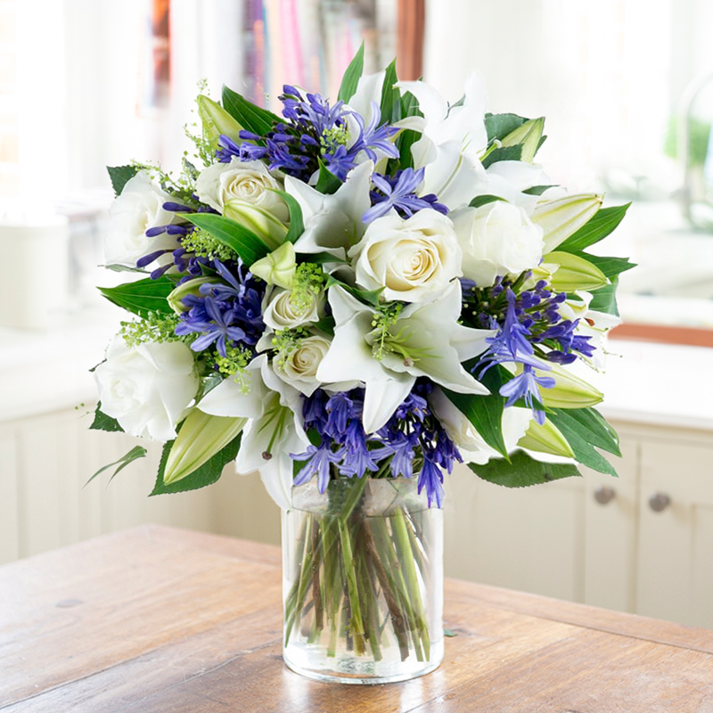 White Lilies, Blue Agapanthus & White Roses | Sapphire Skies Bouquet | White & Blue Flowers | Next Day Flower Delivery UK - Appleyard London